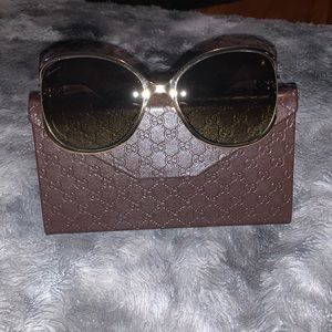 Gucci women’s sunglasses. White and gold with brown lens.